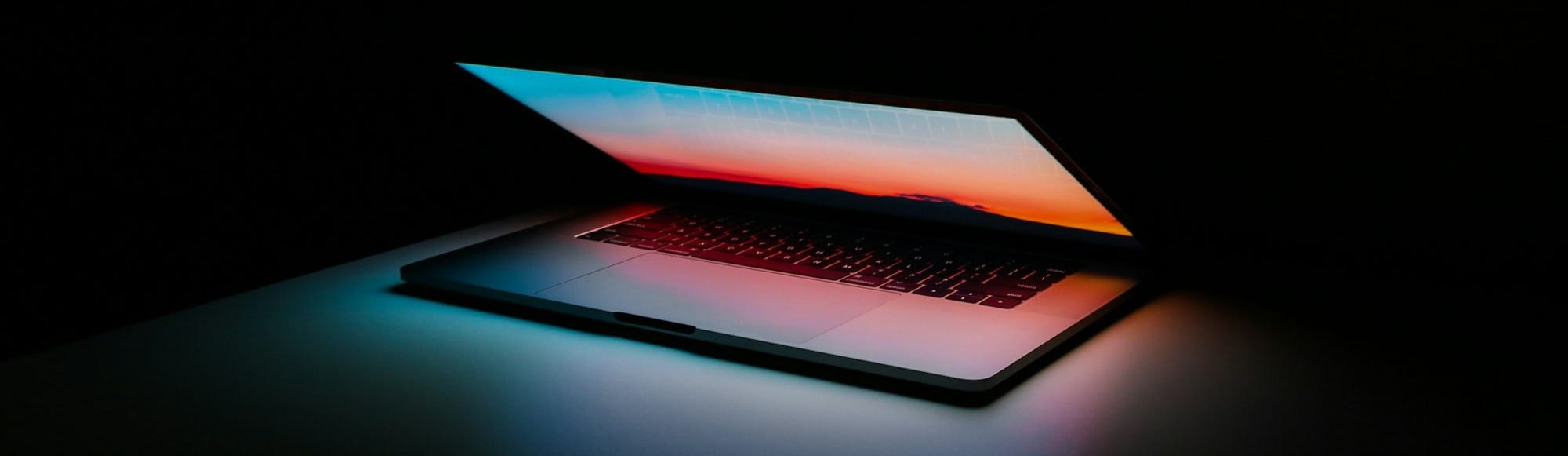 gray and black laptop computer on surface
